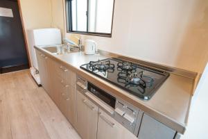A cozinha ou kitchenette de 静心宿Tranquil Retreat 4F晴空塔直达东京河景民宿