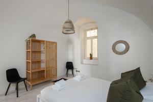 Ένα ή περισσότερα κρεβάτια σε δωμάτιο στο BordiLand 4