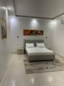 Postel nebo postele na pokoji v ubytování Ixora 2