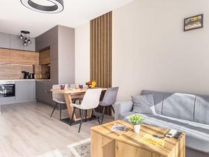 Kuchyň nebo kuchyňský kout v ubytování Modern 1BR Apartment with free Parking and free Gym Pass + 24 fotografií
