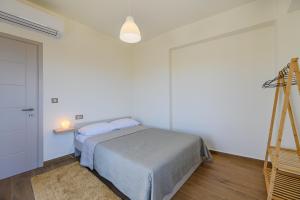 Postel nebo postele na pokoji v ubytování Serenity