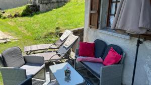 A seating area at Ferienwohnung Rustico ai Monti