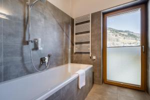 Kúpeľňa v ubytovaní Wildkogel Resorts - DAS Bramberg