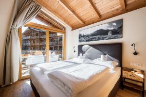Posteľ alebo postele v izbe v ubytovaní Wildkogel Resorts - DAS Bramberg