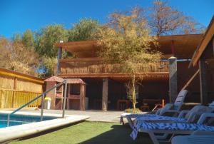 Bazén v ubytování Hostal Hara nebo v jeho okolí