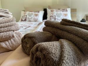 A bed or beds in a room at Ferienwohnung Rustico ai Monti