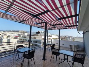 A balcony or terrace at Voda Luxury Residence #401 - Acropolis View Rooftop