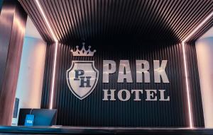 תעודה, פרס, שלט או מסמך אחר המוצג ב-Park Hotel