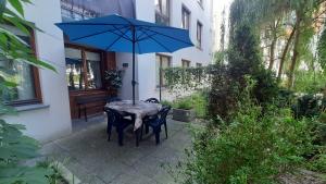 Vonkajšia záhrada v ubytovaní Apartament Osiedle Garnizon