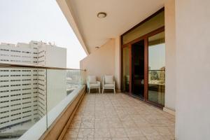 Om Kolthoom Hotel的阳台或露台