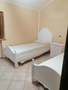 Ένα ή περισσότερα κρεβάτια σε δωμάτιο στο Al Carpine +2 φωτογραφίες