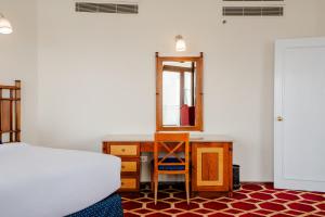 Om Kolthoom Hotel客房内的一张或多张床位