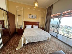 Postel nebo postele na pokoji v ubytování Le Crillon