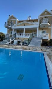 The swimming pool at or close to Irini's Villa
