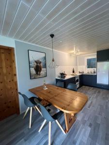 Kuchyň nebo kuchyňský kout v ubytování Cozy Chalet Bergblick