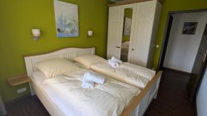 Katil atau katil-katil dalam bilik di Ferienwohnung Alpenblick in Bolsterlang Sommerbergbahn kostenlos