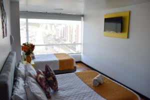 TV a/nebo společenská místnost v ubytování Hotel Aristo Tunja