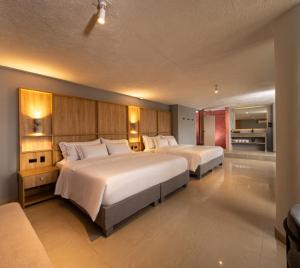 Postel nebo postele na pokoji v ubytování Mood Matuna Hotel Cartagena