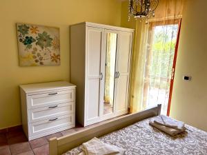 Postel nebo postele na pokoji v ubytování 4Flats in Orto di Venanzio