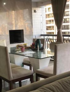 Resort Parc Paradiso的电视和/或娱乐中心