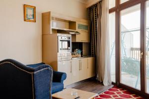Kuchyň nebo kuchyňský kout v ubytování Om Kolthoom Hotel