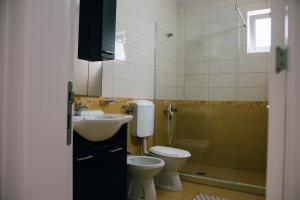 Koupelna v ubytování Premium apartments + 24 fotografií