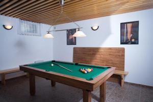 a room with a pool table in a room at Slunečná stráň Rudíkov in Rudíkov