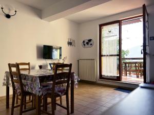 TV a/nebo společenská místnost v ubytování 4Flats in Orto di Venanzio