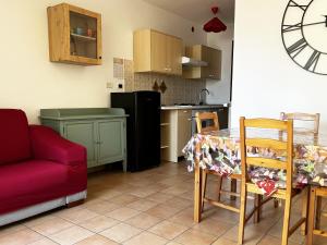 Kuchyň nebo kuchyňský kout v ubytování 4Flats in Orto di Venanzio