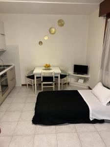 Postel nebo postele na pokoji v ubytování Arryanna Apartment