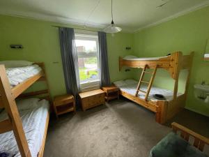Postel nebo postele na pokoji v ubytování Skiers inn