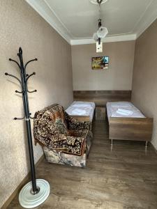 Katil atau katil-katil dalam bilik di Mikheil Pitskhelauri Guest House