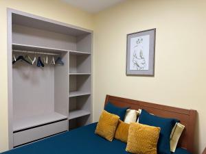 a bedroom with a bed and a closet at Xanda Escape in Machico +20 photos