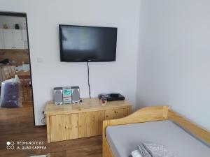 Una cama o camas en una habitación de Apartmán Pod Sjezdovkou