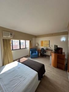 Postel nebo postele na pokoji v ubytování Hotel Live Logde V Mariana Pq Ibirapuera UH-511