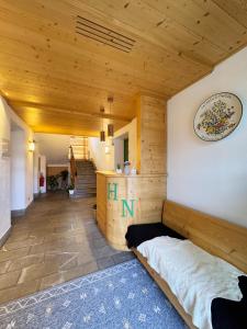 Postelja oz. postelje v sobi nastanitve Neider Hotel - Alpine Retreat Sauris