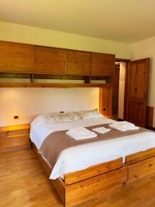 Postelja oz. postelje v sobi nastanitve Neider Hotel - Alpine Retreat Sauris