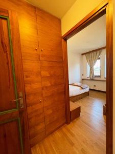 Postelja oz. postelje v sobi nastanitve Neider Hotel - Alpine Retreat Sauris