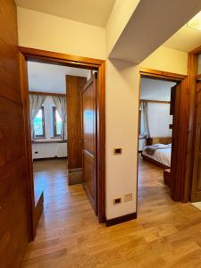 Postelja oz. postelje v sobi nastanitve Neider Hotel - Alpine Retreat Sauris
