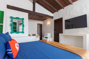 TV a/nebo společenská místnost v ubytování Casa Flora Búzios