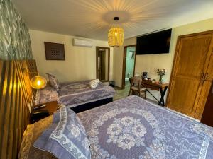 Postel nebo postele na pokoji v ubytování Hotel Isabel + 31 fotografií