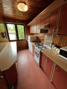 Η κουζίνα ή μικρή κουζίνα στο Leśny Domek