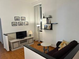 TV a/nebo společenská místnost v ubytování La Casa di Ale