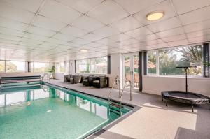 an indoor swimming pool in a house at Country Retreat with Grounds & Leisure Facilities in Brighouse