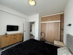 TV a/nebo společenská místnost v ubytování Aqua Blue TOP Apartment