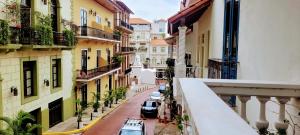 a view of a city street with cars parked on the street at Beautiful apartment in Casco Viejo, Casa Rio Apt #2 in Panama City +5 photos