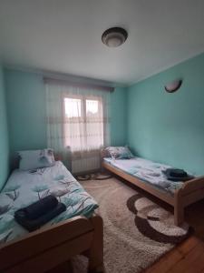 Postel nebo postele na pokoji v ubytování Rural Household Baltic + 30 fotografií