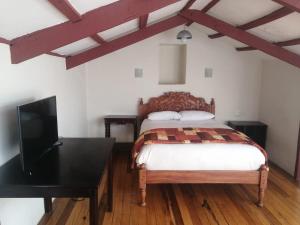Cama o camas de una habitación en Departamentos Cusco