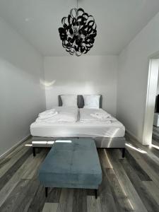 Postel nebo postele na pokoji v ubytování MILANO Messe Business Ferienwohnung Düsseldorf