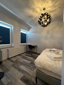 Postel nebo postele na pokoji v ubytování MILANO Messe Business Ferienwohnung Düsseldorf